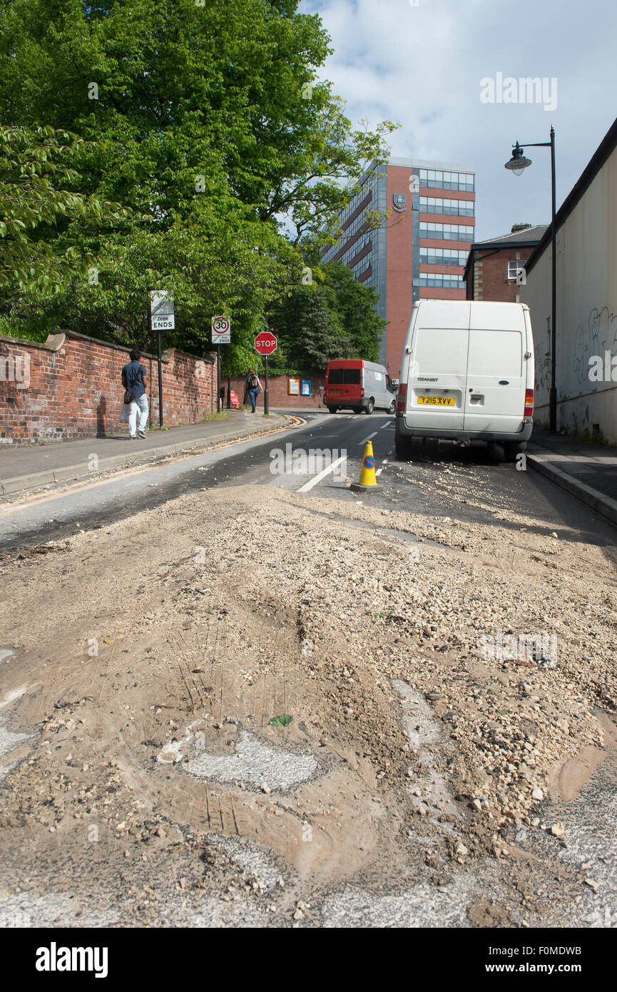Yorkshire Water repair a major leak in one of their pipes on a Glossop Road in Sheffield Stock