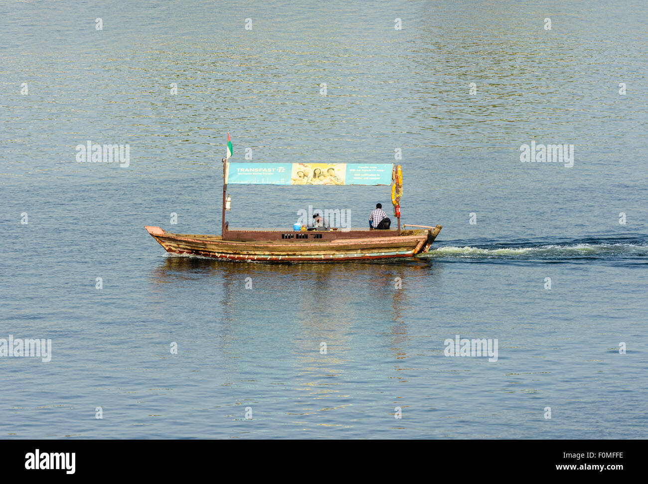 Traditional Abra boat on the Dubai Creek, Dubai, UAE Stock Photo