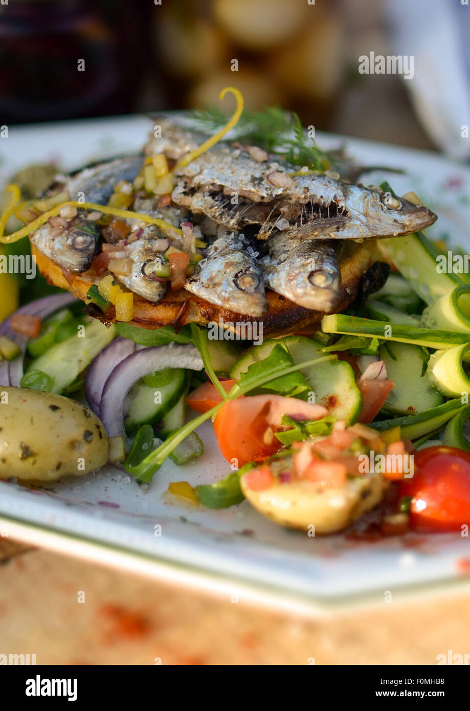 Sardines fish cooked food,  cooked, meal, grilled, lunch, cuisine, healthy, seafood, gourmet, fresh, sardine, plate, Mediterrane Stock Photo