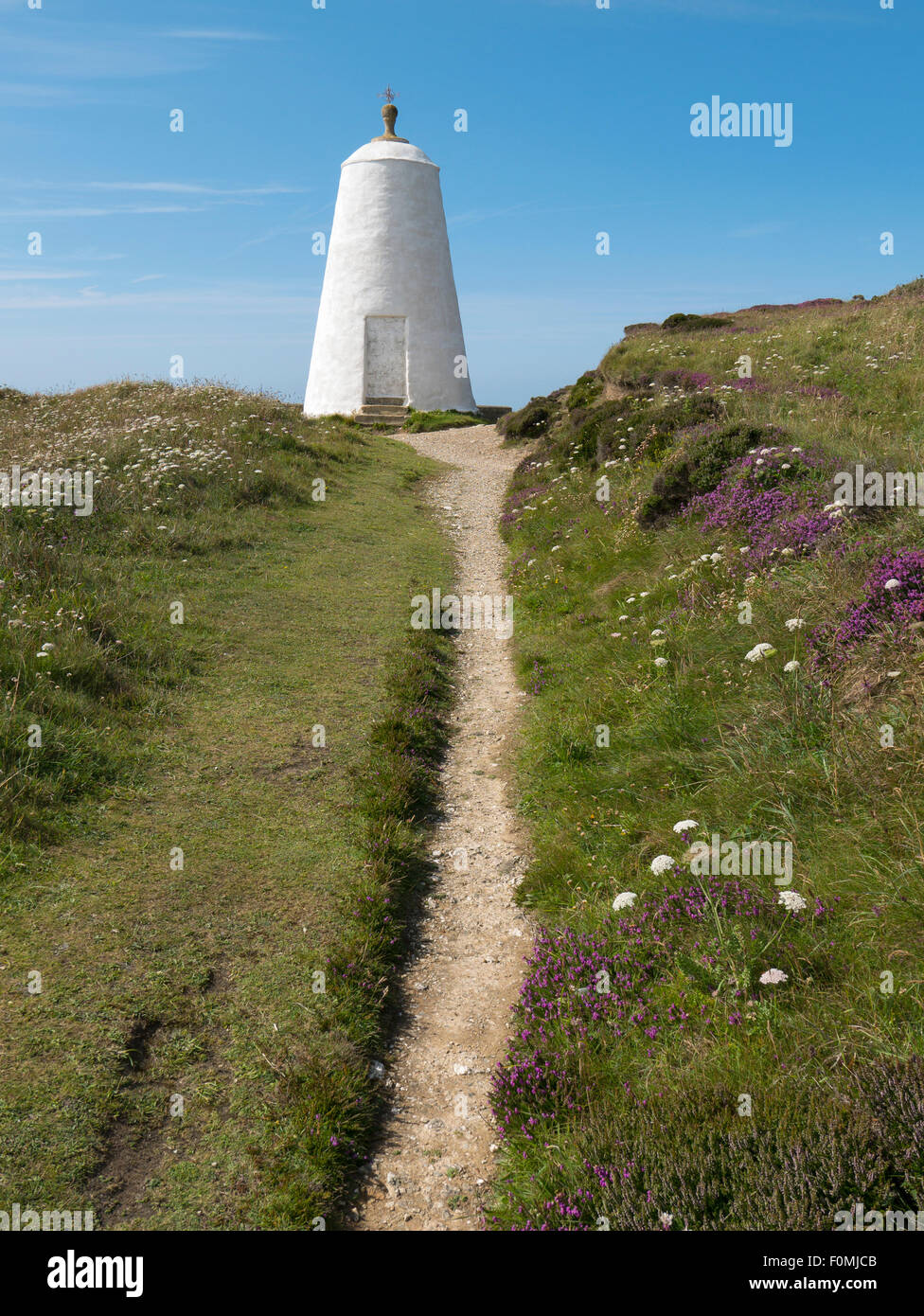 Narrow path to the Pepper pot day mark high above Portreath, Cornwall UK. Stock Photo