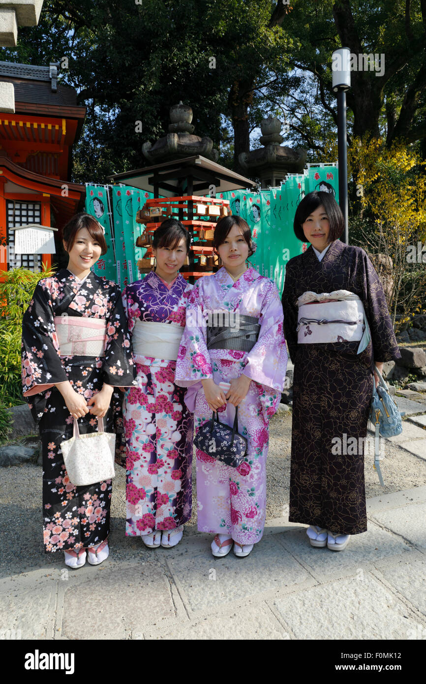 Young Japanese girls in traditional kimonos, Yasaka Shrine, Kyoto, Japan, Asia Stock Photo