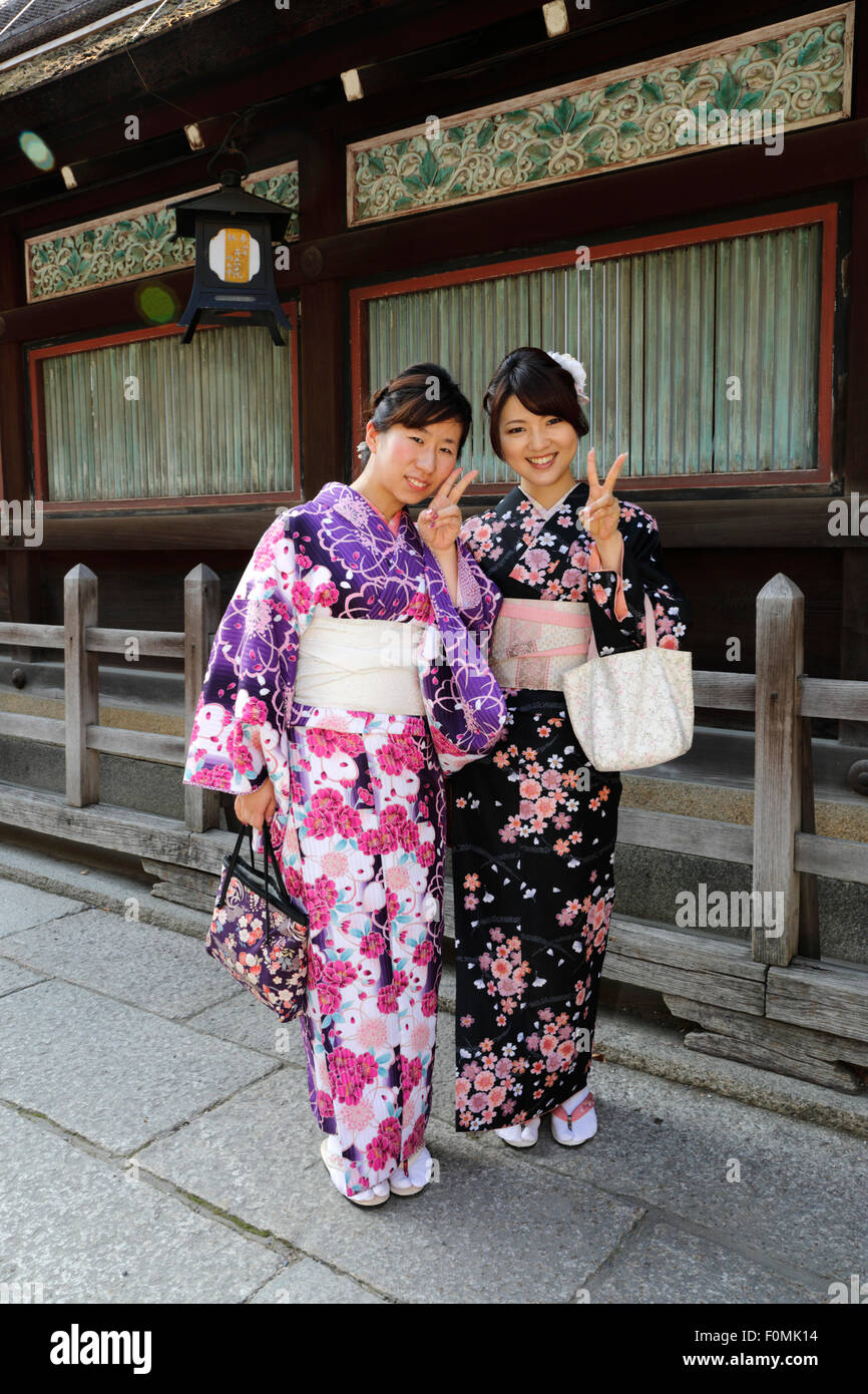 Young Japanese girls in traditional kimonos, Yasaka Shrine, Kyoto, Japan, Asia Stock Photo