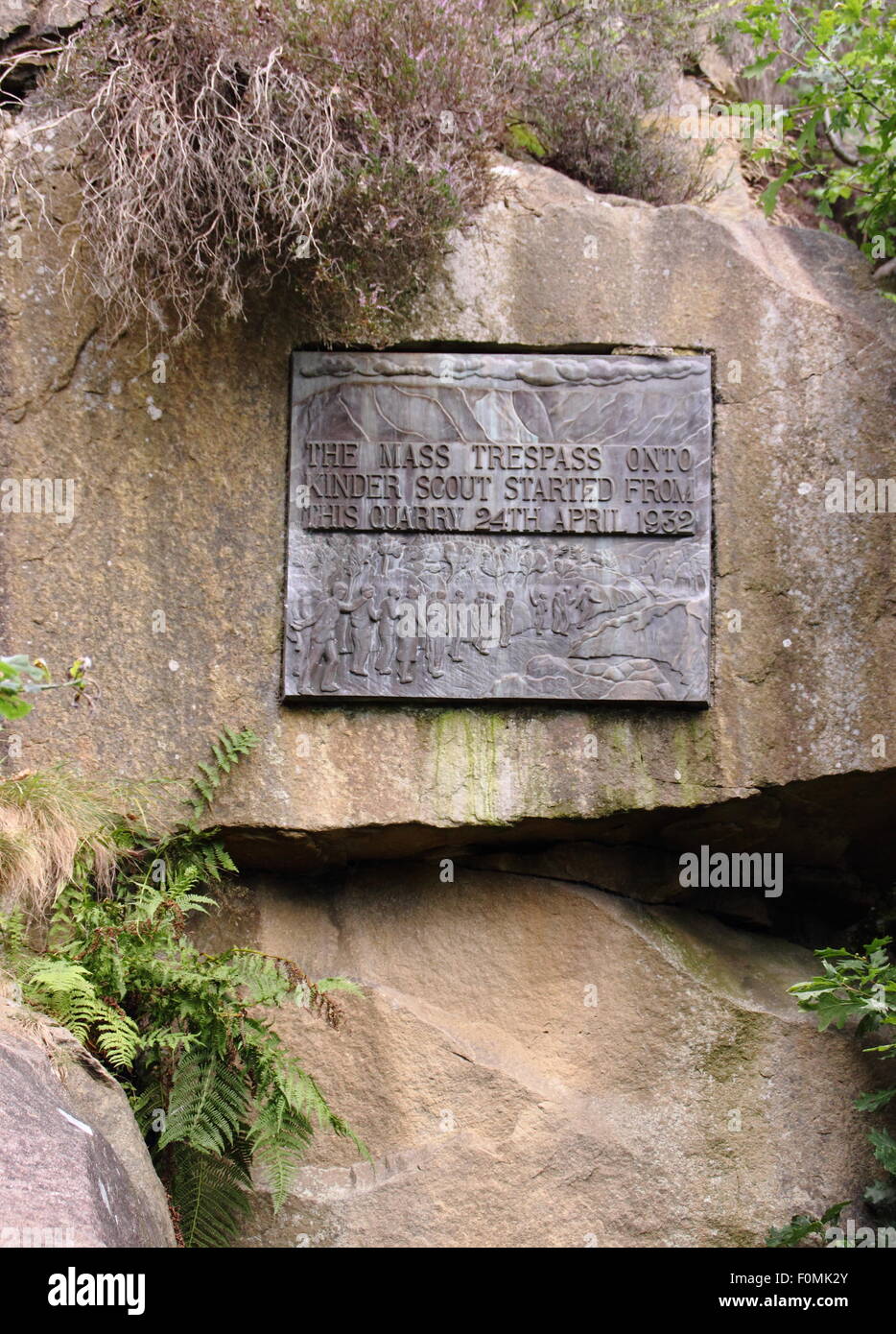 A plaque commemorating the mass trespass of kinder scout by walkers, Bowden Bridge quarry car park, near Hayfield, Derbyshire UK Stock Photo