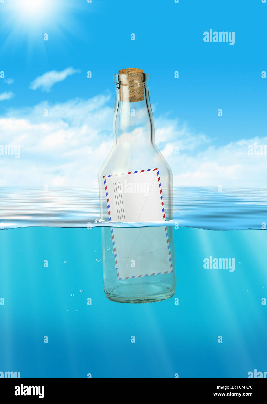 Mail in bottle float at sea, communication concept Stock Photo