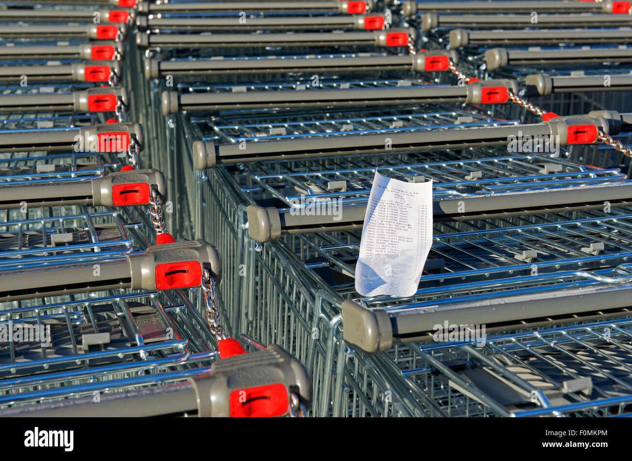 Trolleys outside Aldi store, UK Stock Photo Alamy