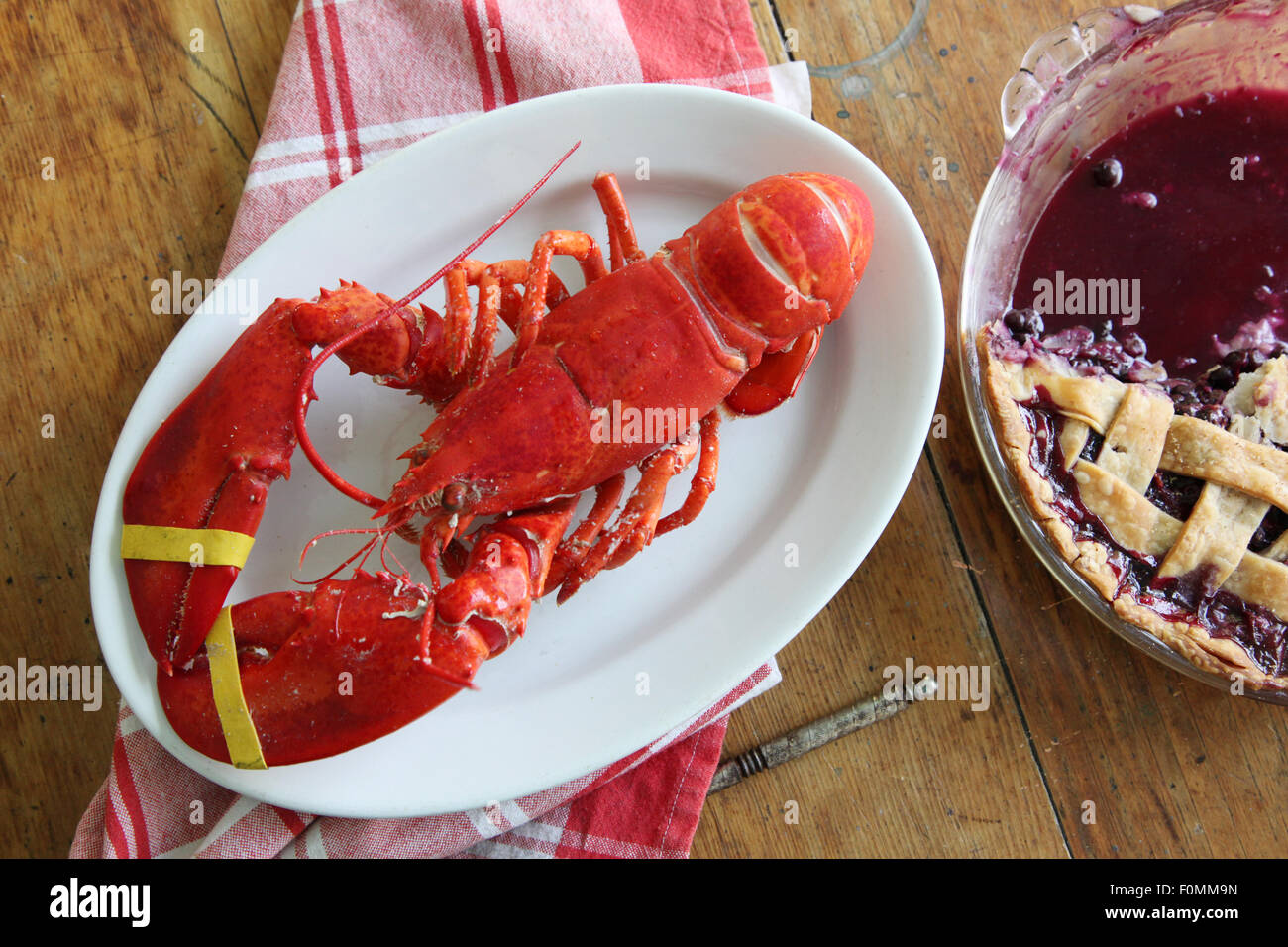 Maine lobster with blue berry pie, a new england meal Stock Photo