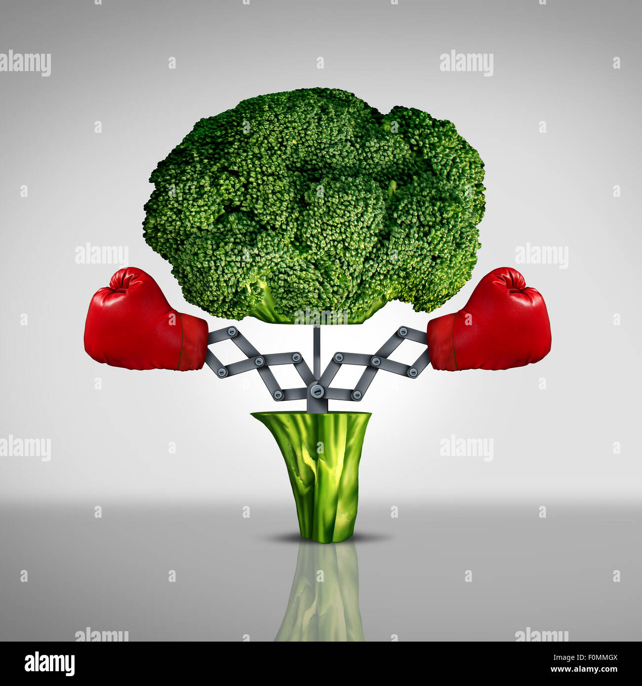 Superfood protection health care concept and cancer disease fighting food symbol as a healthy natural nutrition icon with red boxing gloves emerging out of an open broccoli vegetable as a fitness diet metaphor. Stock Photo
