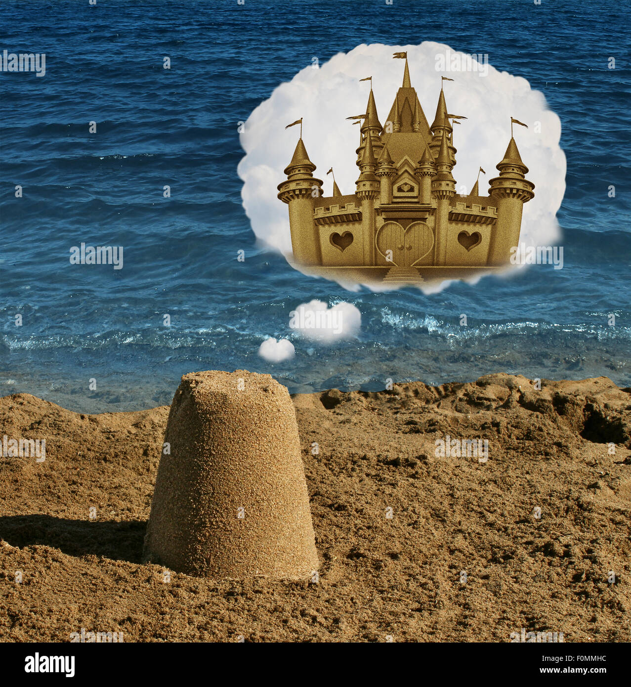 Think big concept and positive visualization symbol as an ordinary basic sand shape dreaming and imagining greatness as a majestic castle as a metaphor to imagine future potential and success focus in business and life. Stock Photo