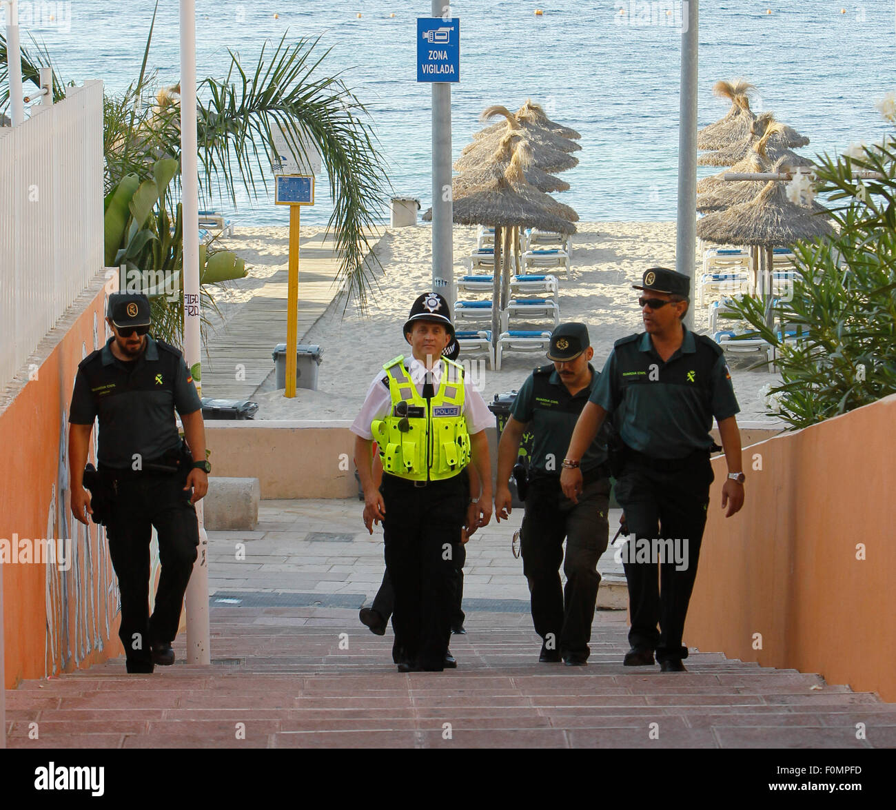 British officers in collaboration with spanish police patrol the touristic area of Magaluf Stock Photo