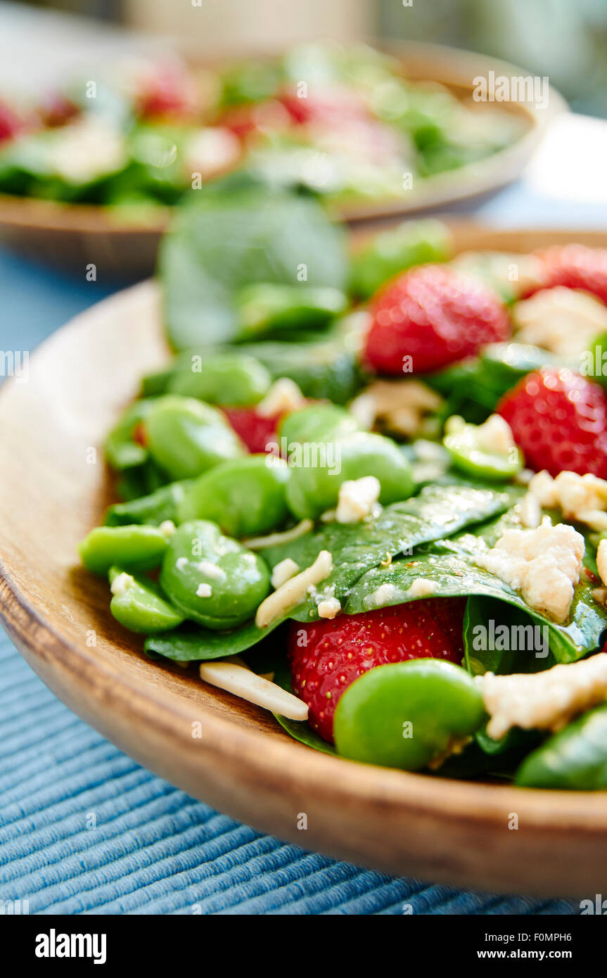 Fava bean, spinach and strawberry salad Stock Photo