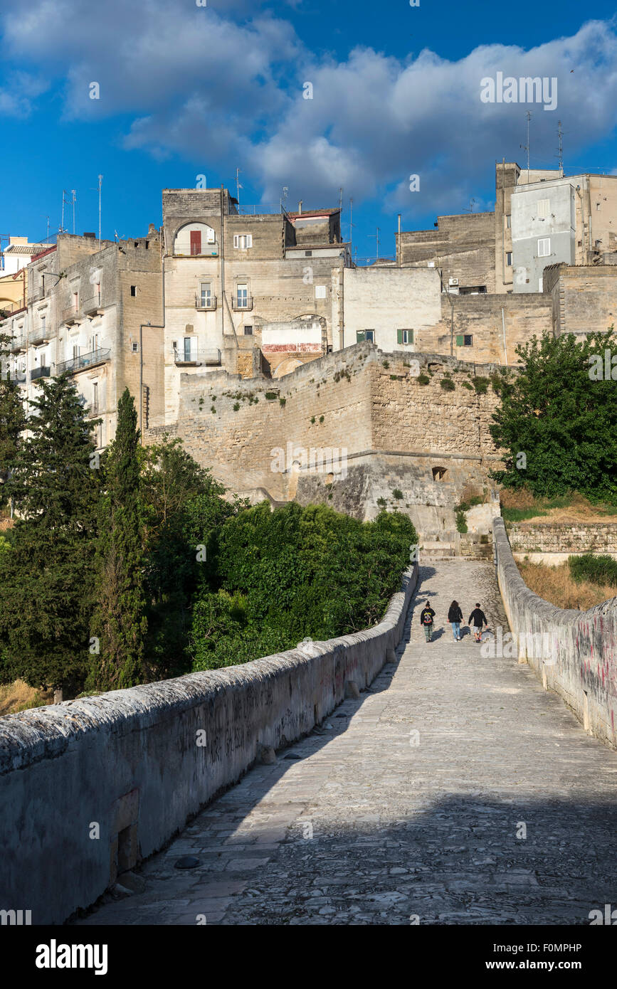 On the Roman bridge across the gorge at the town of Gravina in Puglia, Puglia, Southern Italy. Stock Photo