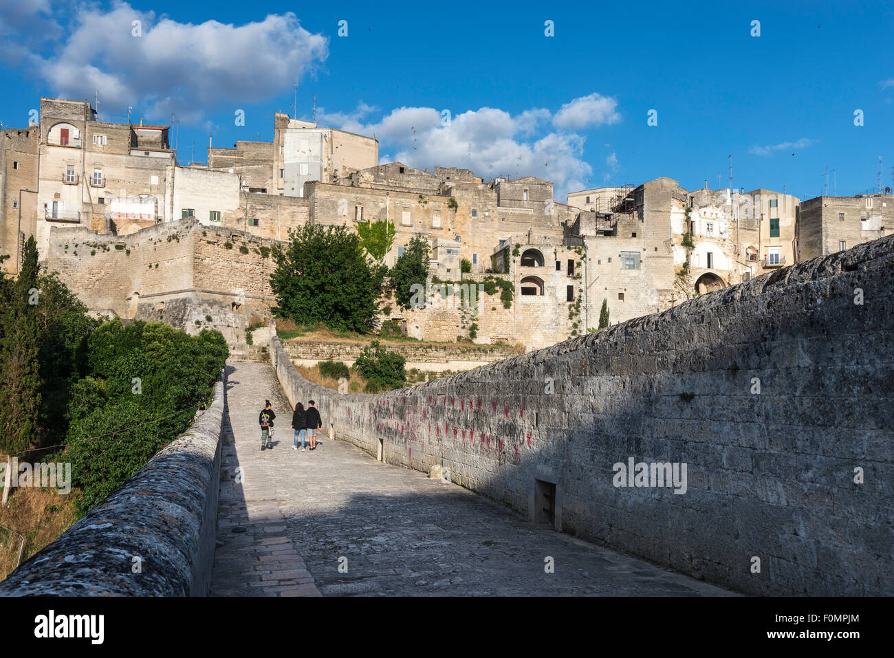 On the Roman bridge across the gorge at the town of Gravina in Puglia, Puglia, Southern Italy. Stock Photo