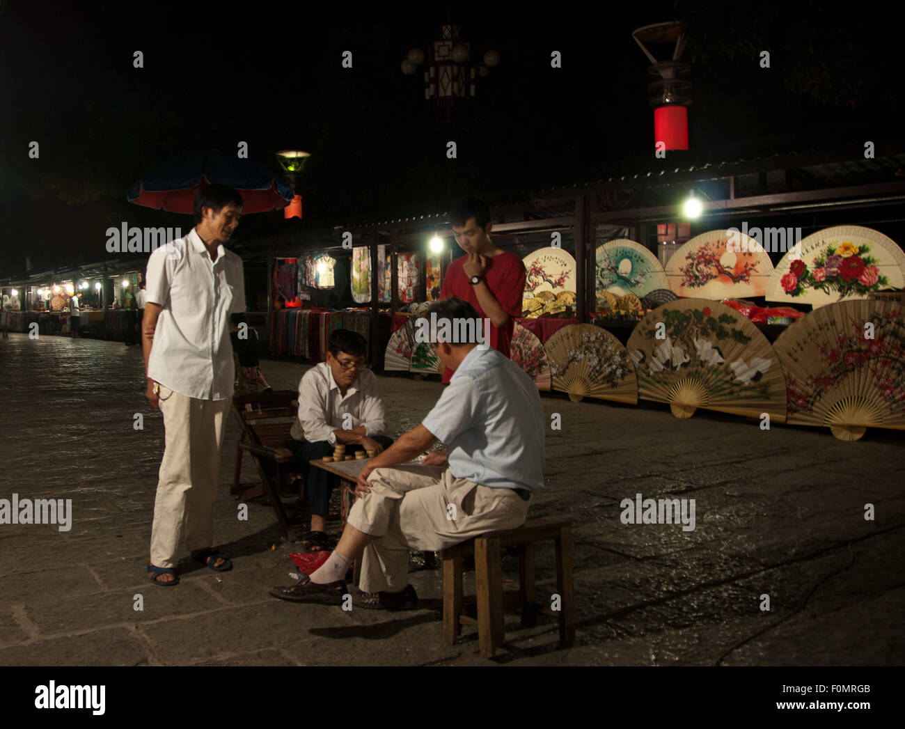 Old men playing traditional table game in the street Stock Photo Alamy