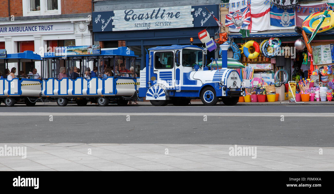 The 'land train' tourist ride in Exmouth, stopping outside a beach shop  Stock Photo - Alamy