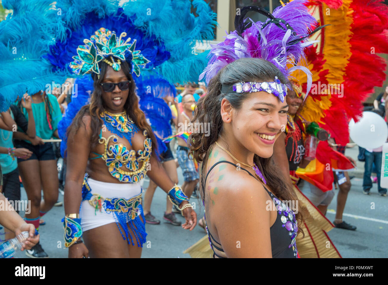 MONTREAL, CANADA, 16th August 2015. A young female dancer is smiling at the camera at the 2015 Gay Pride Parade in Montreal. © Marc Bruxelle/Alamy Live News Stock Photo