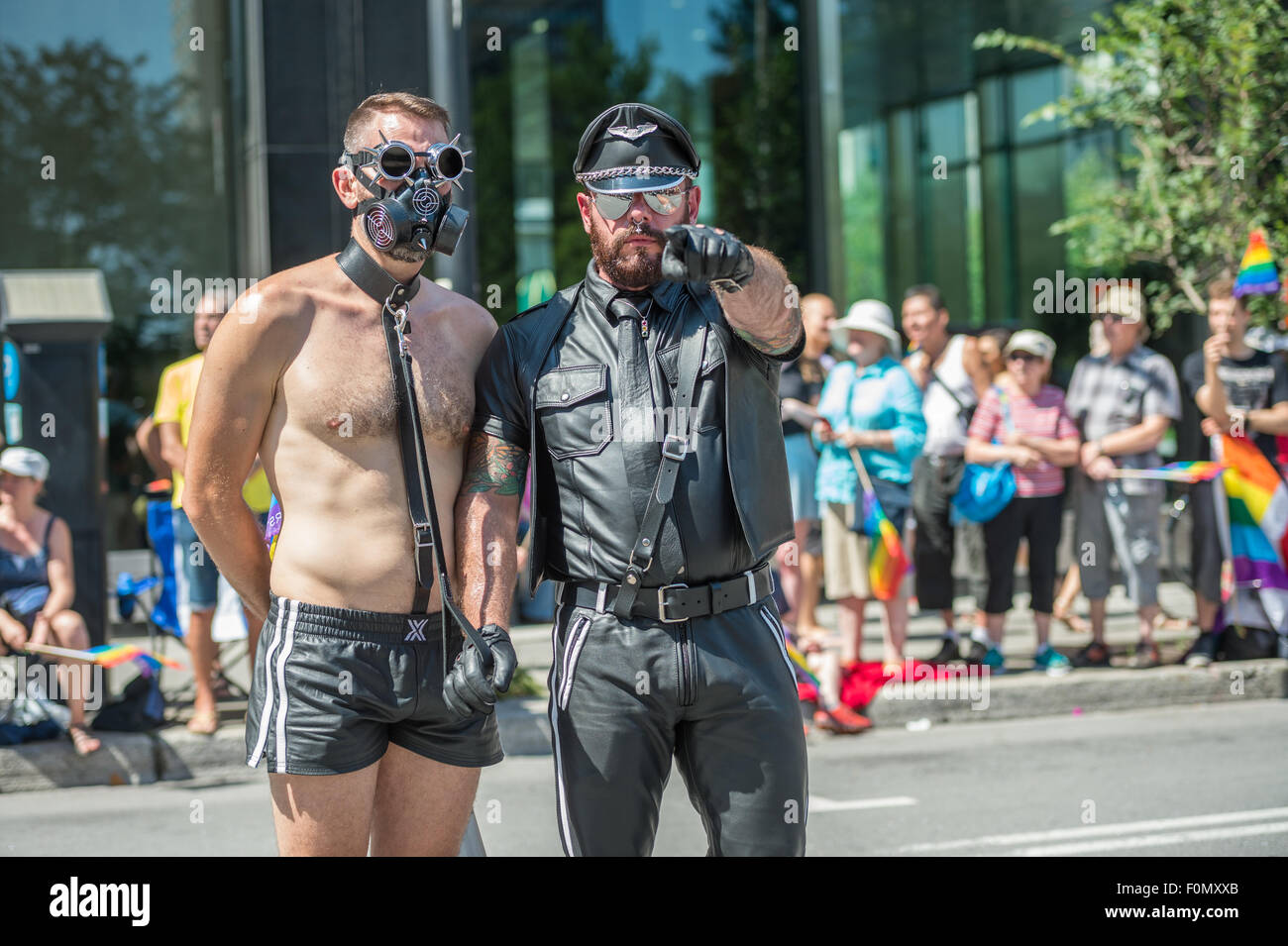 MONTREAL CANADA Th August A BDSM Master And His Slave Pose At The Gay Pride