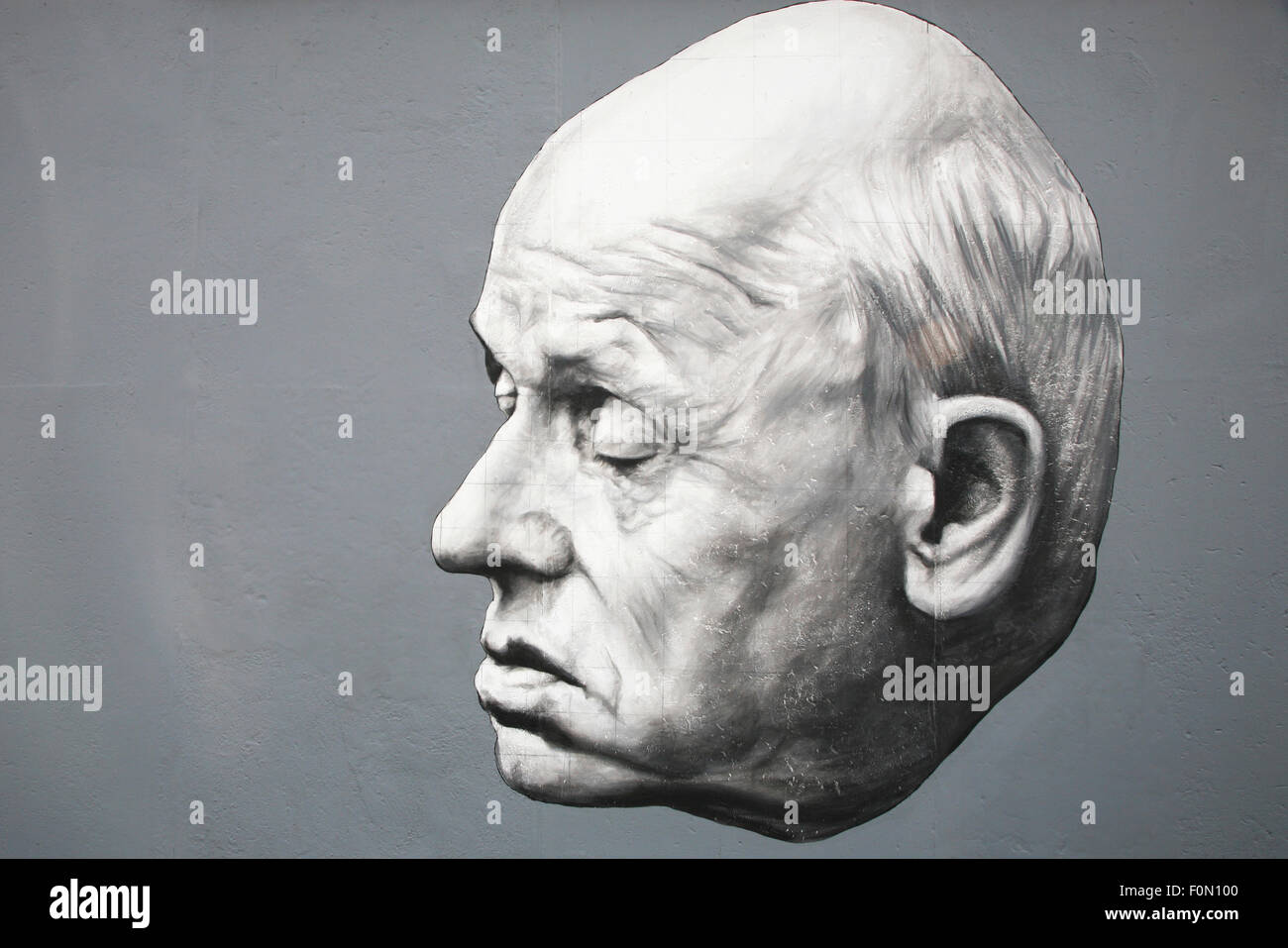 Famous graffiti of academician Andrei Sakharov on Berlin Wall at East Side Gallery August 08, 2009 in Berlin Stock Photo