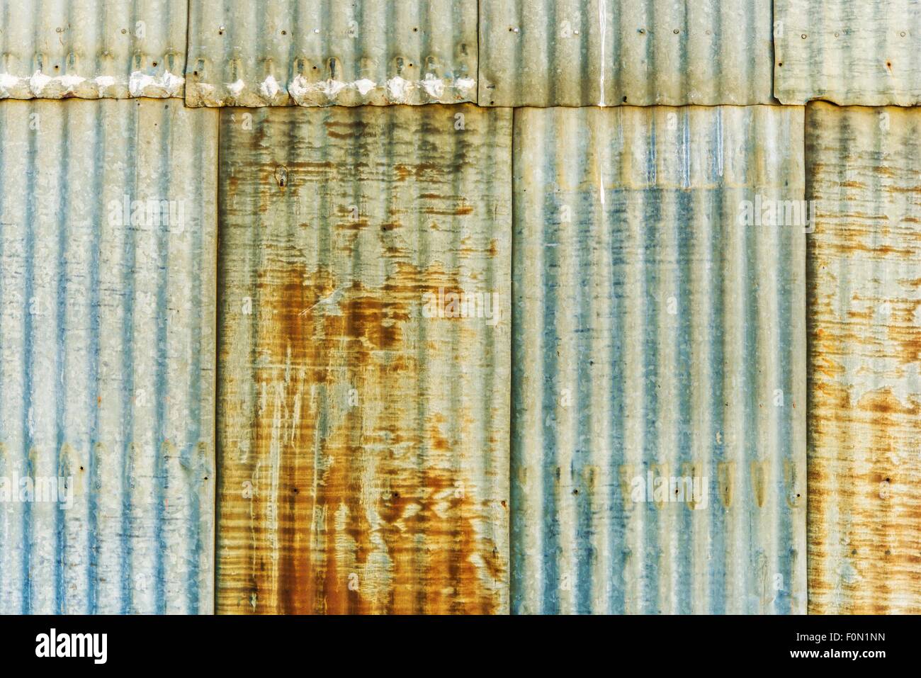 Aged Rusty Corrugated Metal Panels Photo Background. Stock Photo