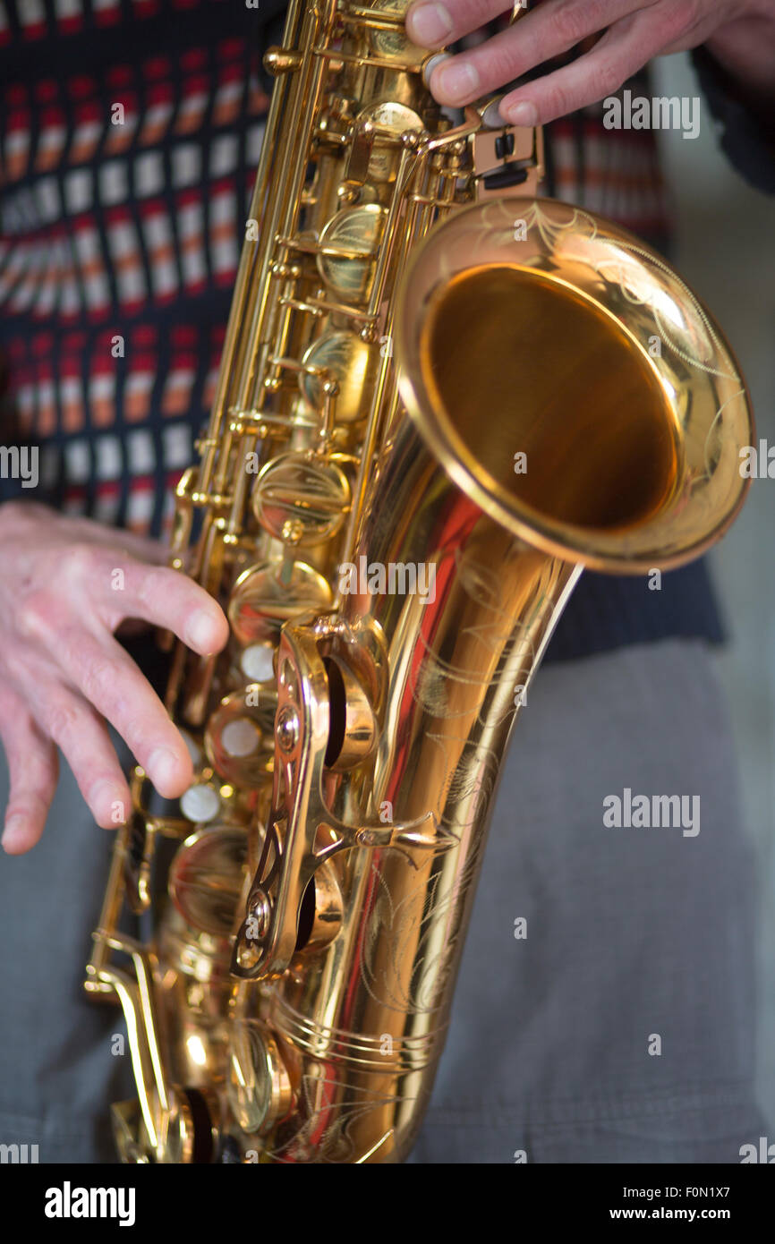 Close-up on hands playing saxophone during a jazz concert in Brussels. Stock Photo