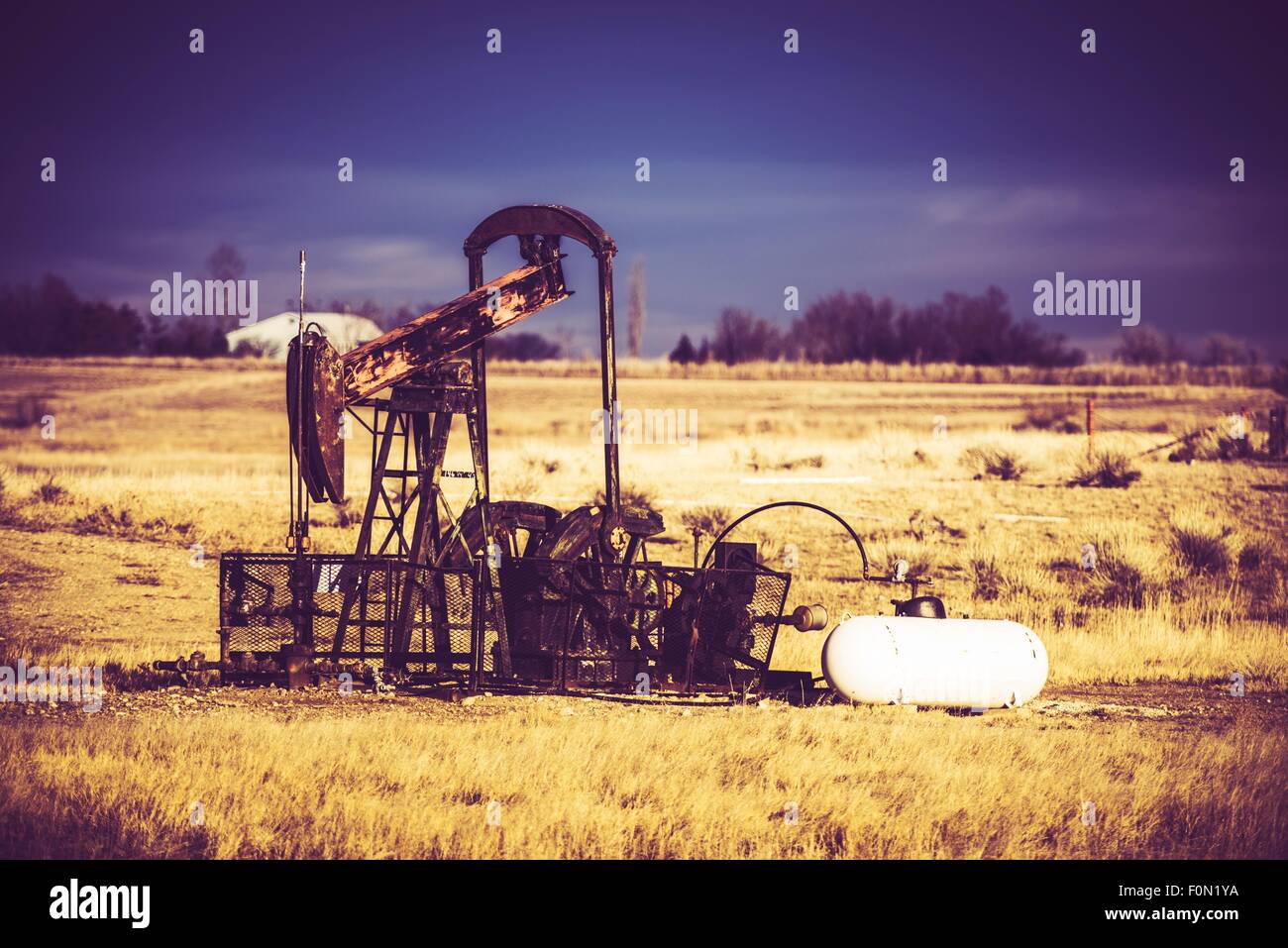 Vintage Rusty Oil Pump in Colorado, United States. Stock Photo