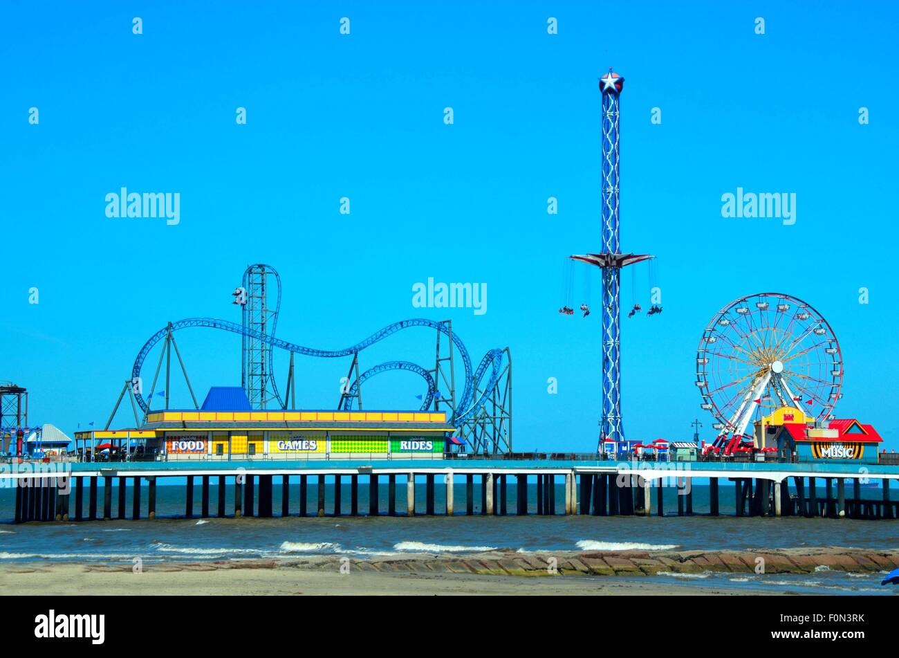 Amusement park located on a ocean beachfront Stock Photo