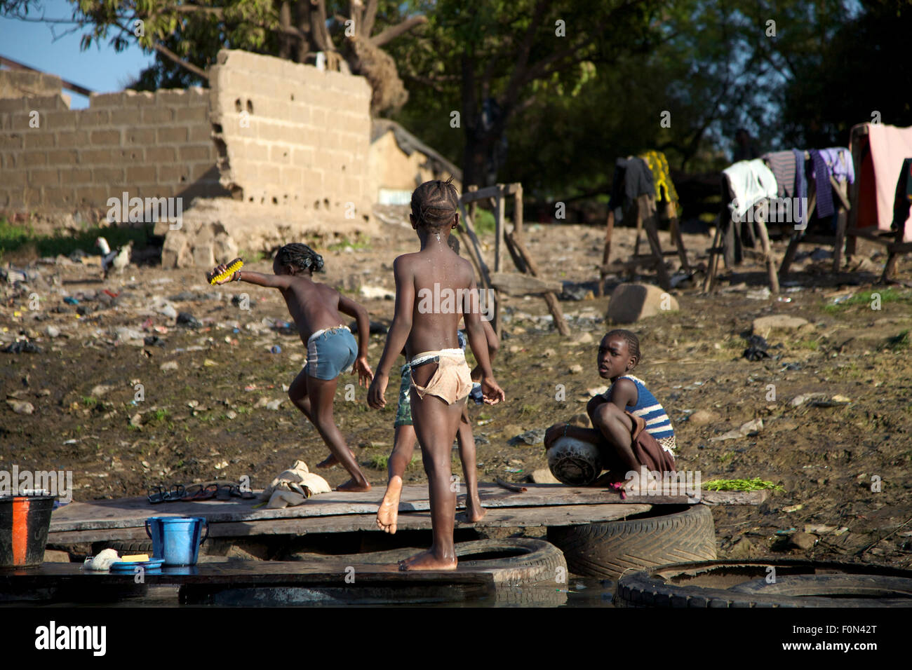 Kids playing in the river The Niger, Bamako. Stock Photo