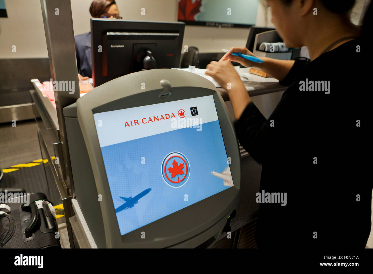 Air Canada Self-Service Check-In kiosk - Ronald Reagan Washington National Airport, Washington, DC USA Stock Photo