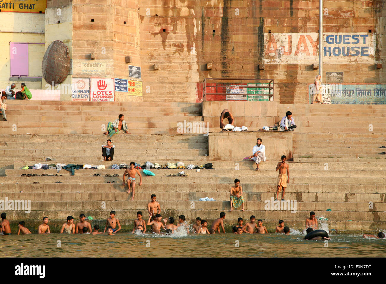 Unidentified Hindu pilgrims take bath and pray in the holy water of Ganges river on June 1, 2009 Stock Photo