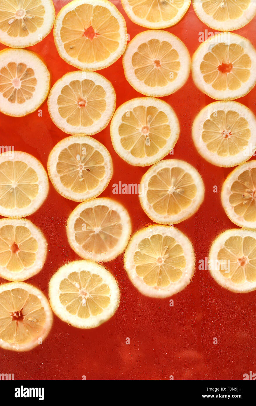 Fresh lemons floating in lemonade Stock Photo Alamy