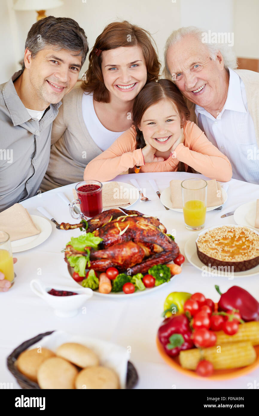 Happy family at Thanksgiving table Stock Photo - Alamy