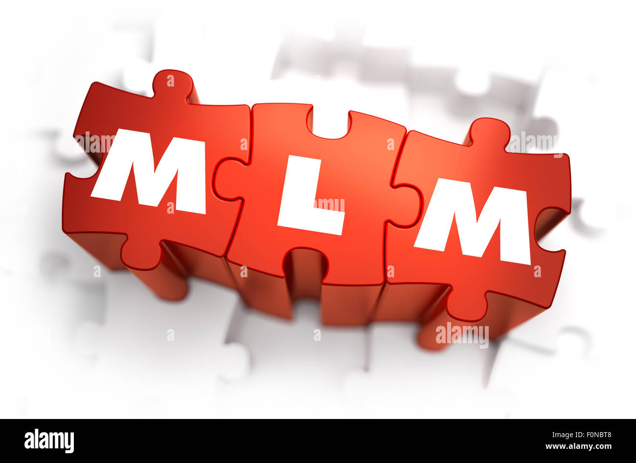 MLM - White Word on Red Puzzles. Stock Photo