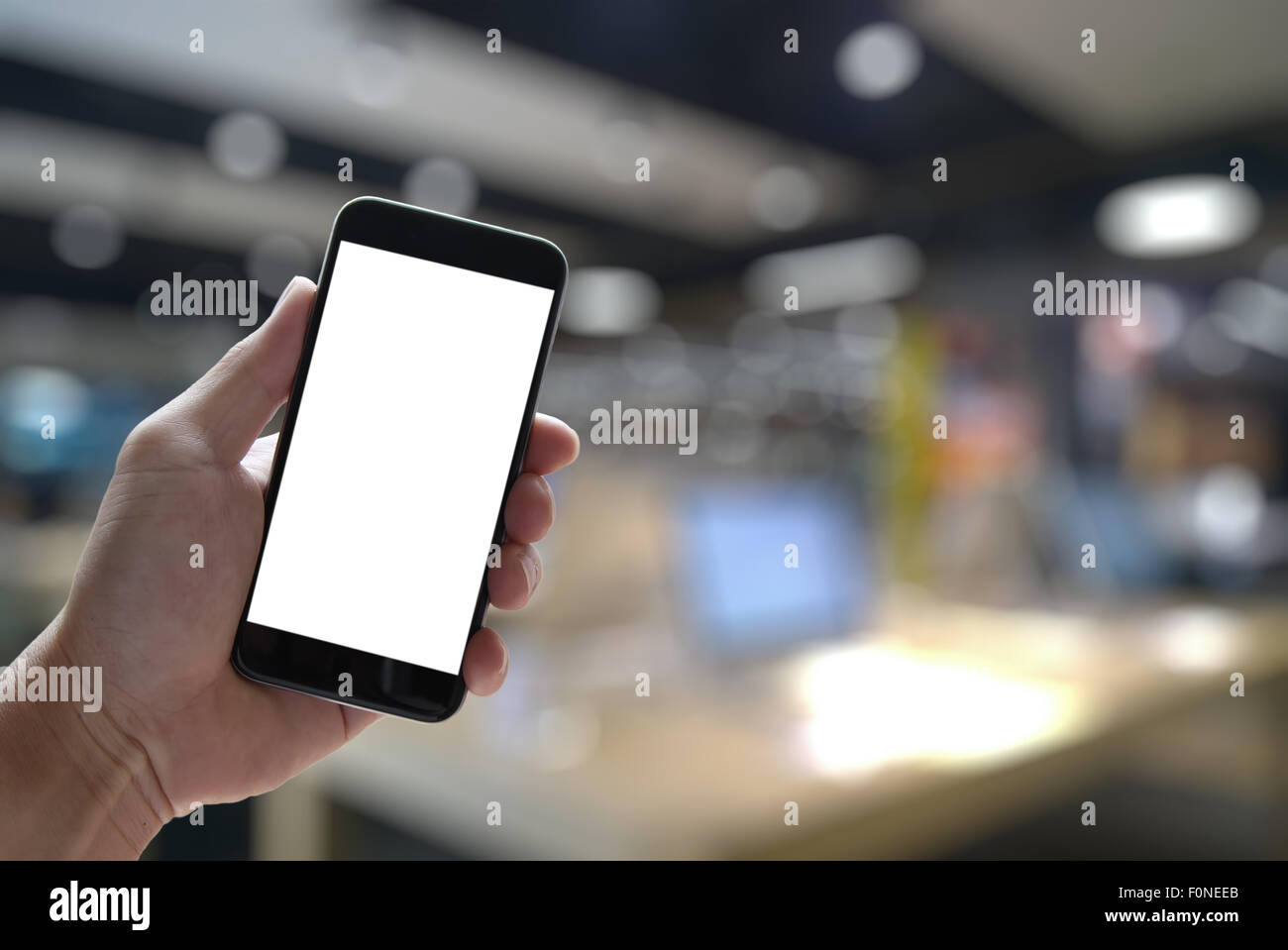 Closeup of Hand holding Blank Screen of Smart phone with blurred ...
