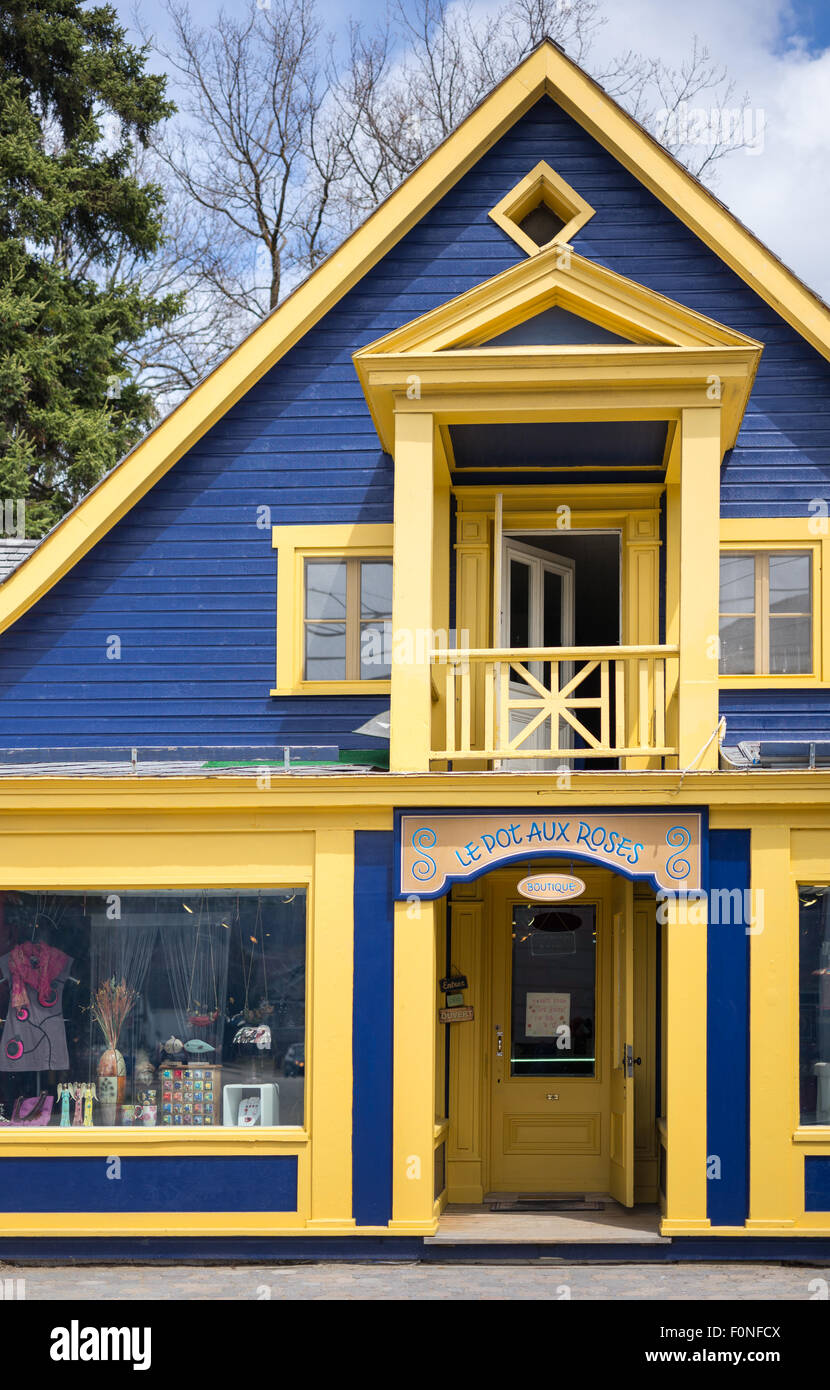 Quebec, Baie Saint Paul, colored houses and stores in St Jean Baptiste