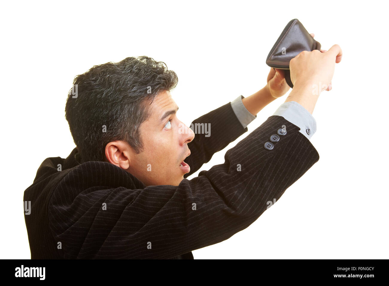 Businessman looking in his empty wallet Stock Photo