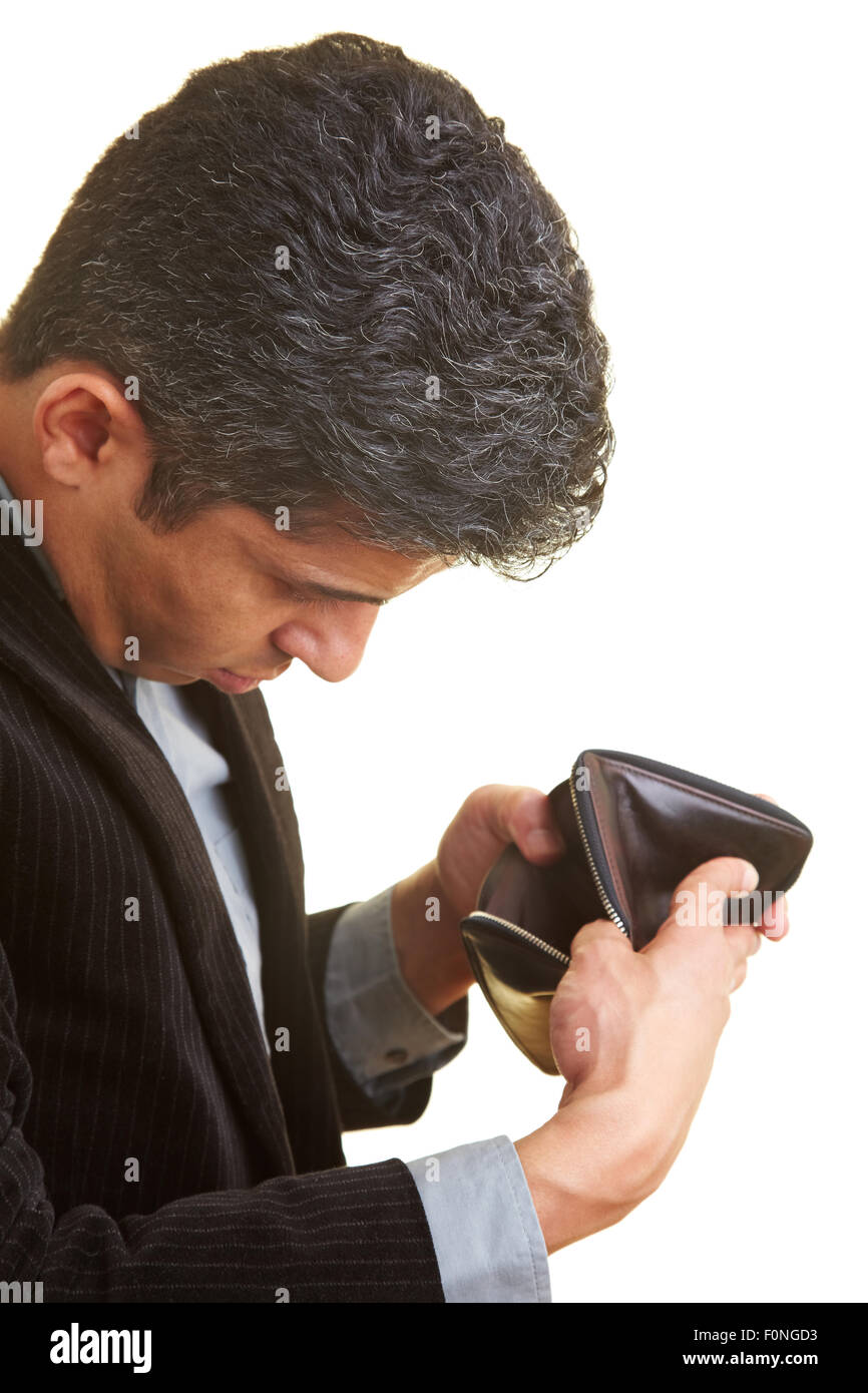 Businessman looking in his empty wallet Stock Photo