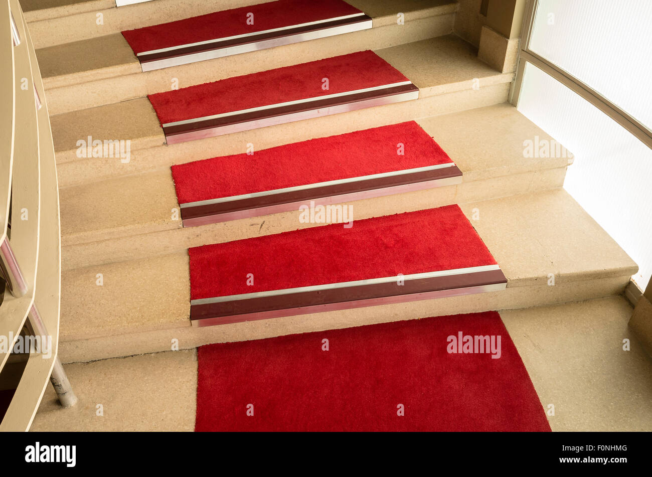 Red carpet on spiral staircase in the Midland Hotel Morecambe; Hotel; Stock Photo
