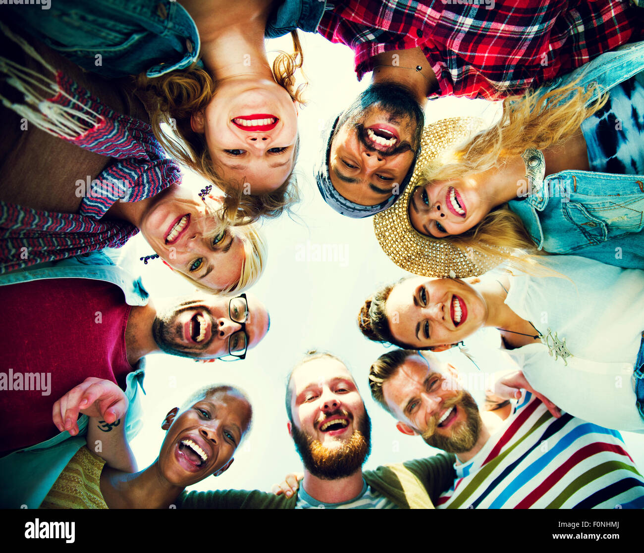 Friends Huddle Join Holiday Party Group Concept Stock Photo