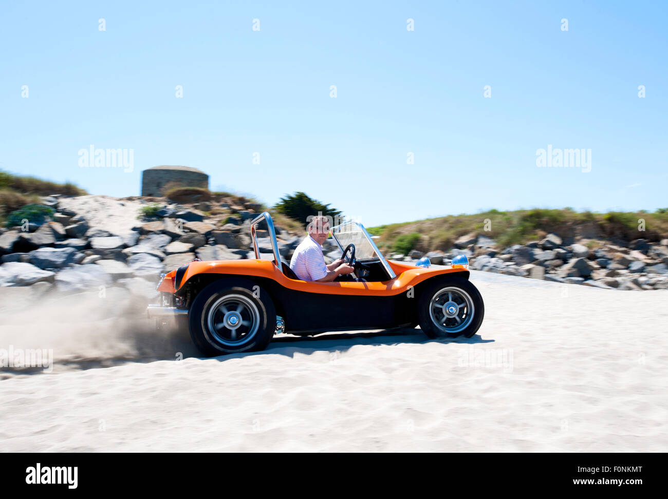 Beach buggy on a sandy beach. VW Beetle based dune buggy car Stock Photo