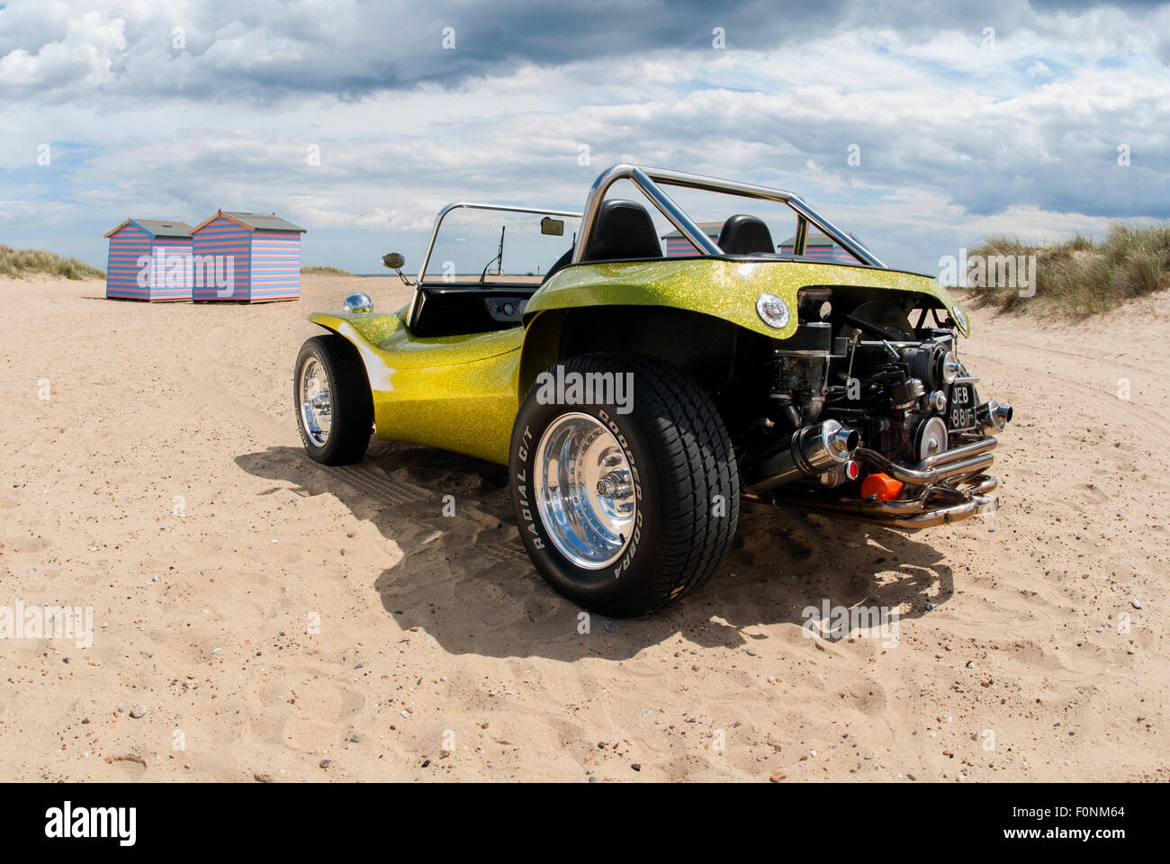 Beach buggy on a sandy beach. VW Beetle based dune buggy car Stock Photo