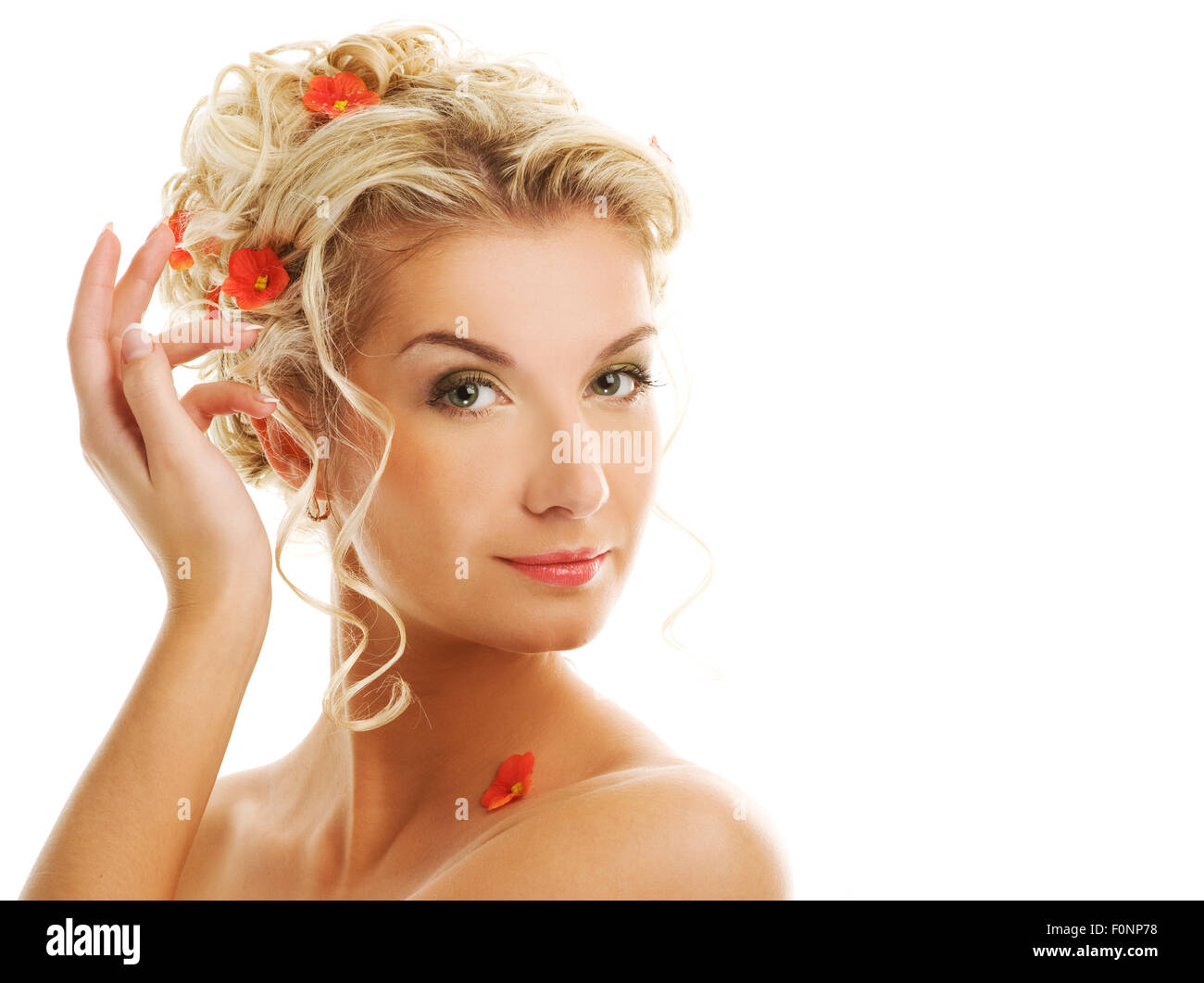 Beautiful young woman with flowers in her hair Stock Photo - Alamy