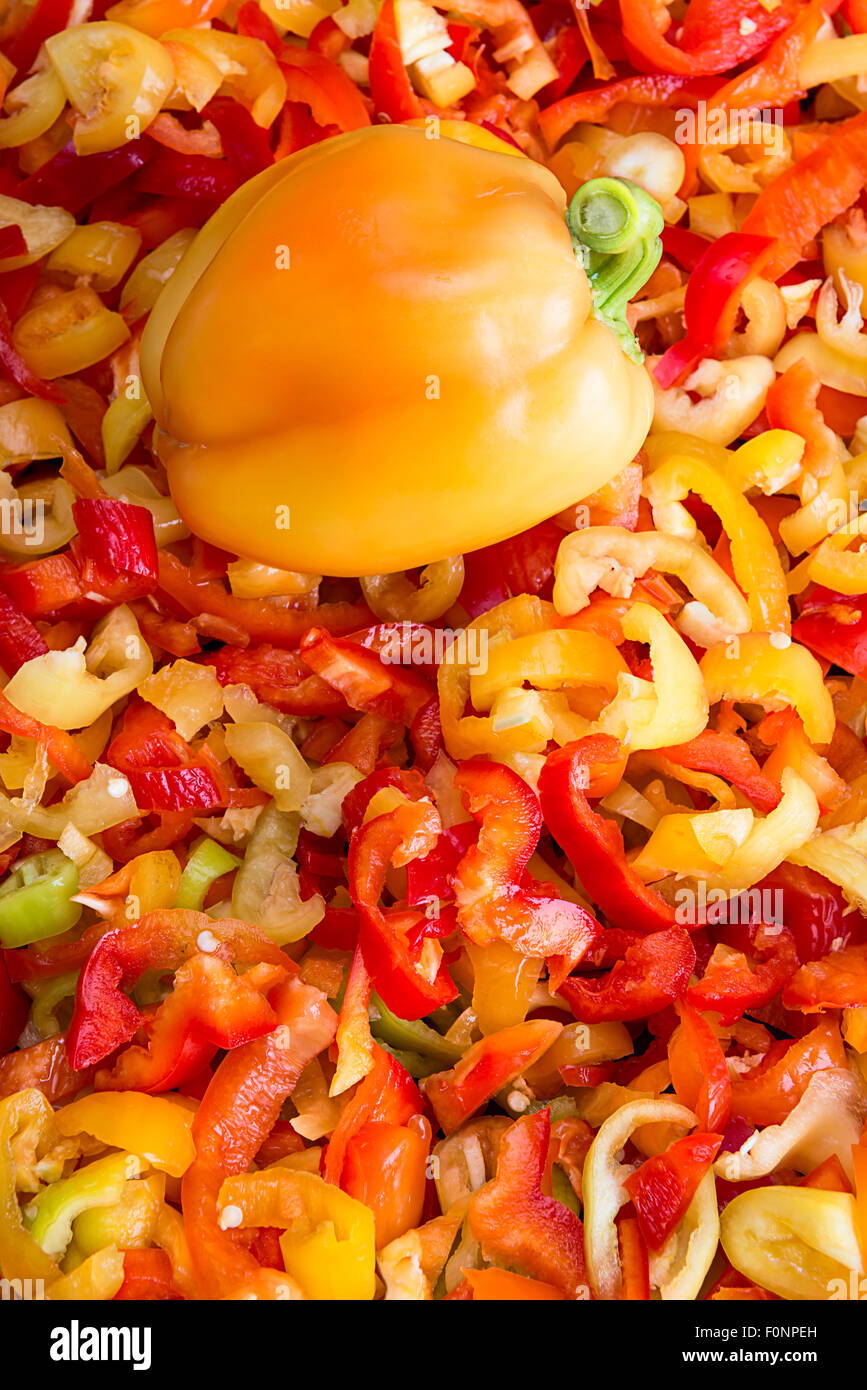 colorful bell pepper slices and whole fruit Stock Photo