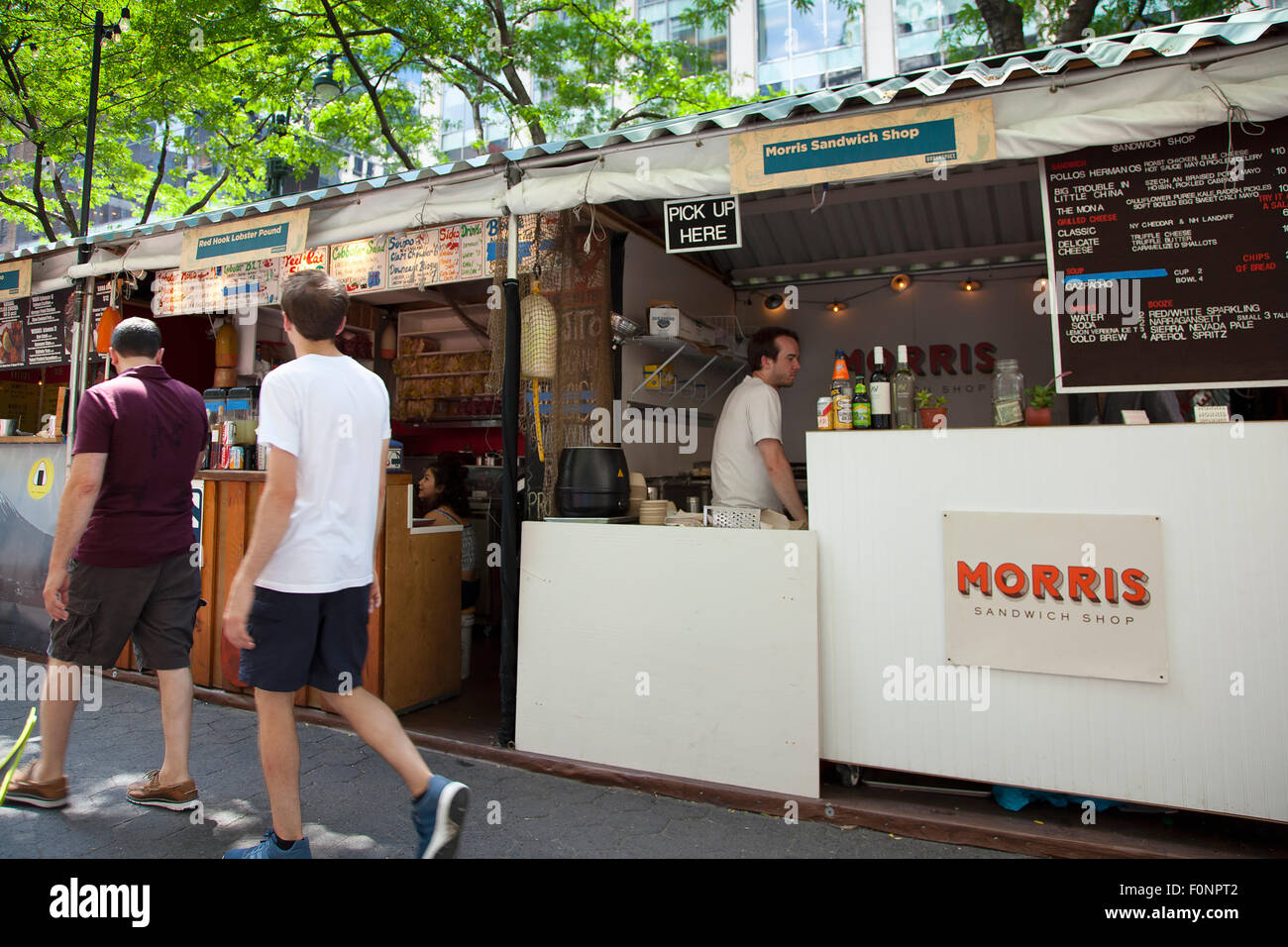 USA, New York State, New York City, Manhattan, Broadway Bites seasonal popup food stalls in Greeley Square Park. Stock Photo