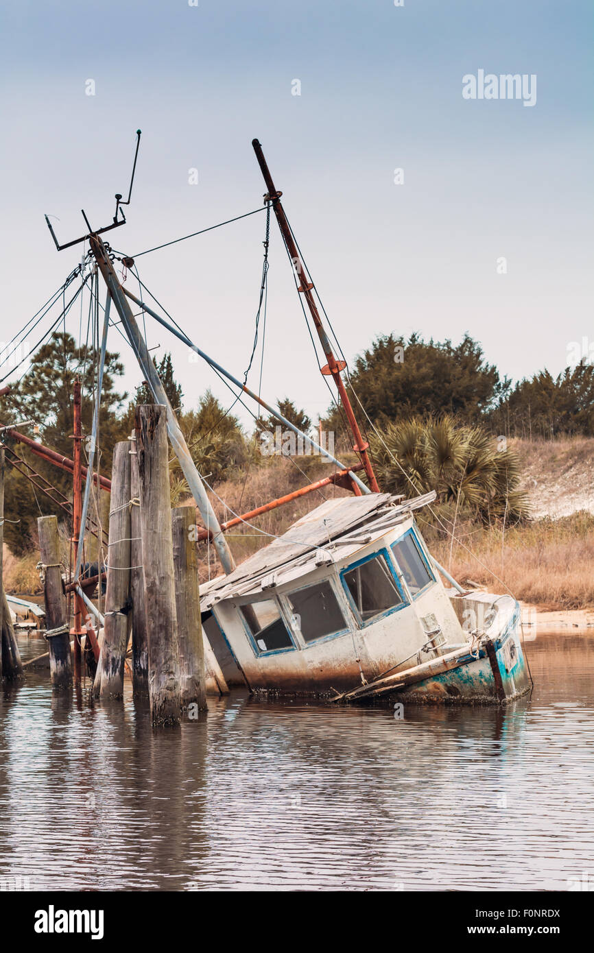 Old shrimping boat destroyed by hurricanes in Florida Stock Photo