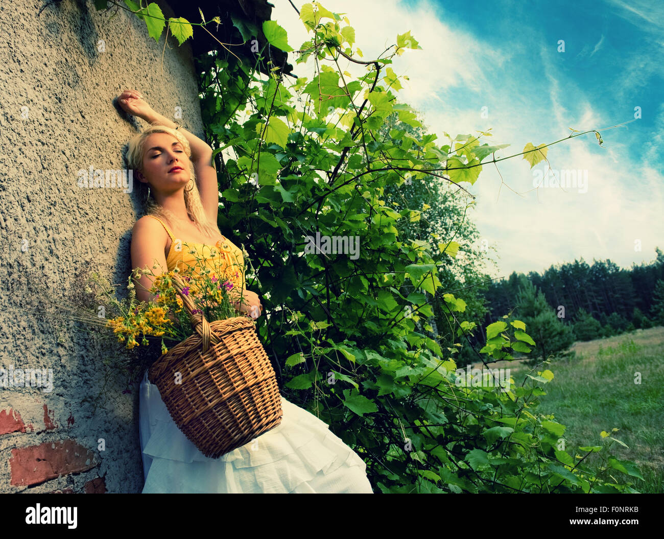 Beautiful woman relaxing outdoor Stock Photo - Alamy