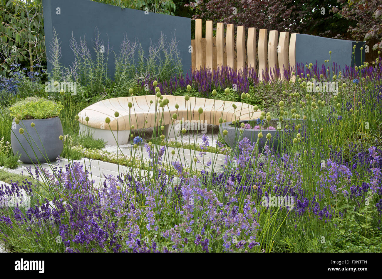 The living Landscapes: Healing Urban Garden designed by Rae Wilkinson at RHS Hampton Court Palace Flower Show 2015 Stock Photo