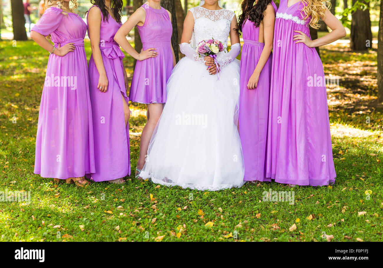 Two bridesmaids holding bouquet hi-res stock photography and images - Alamy