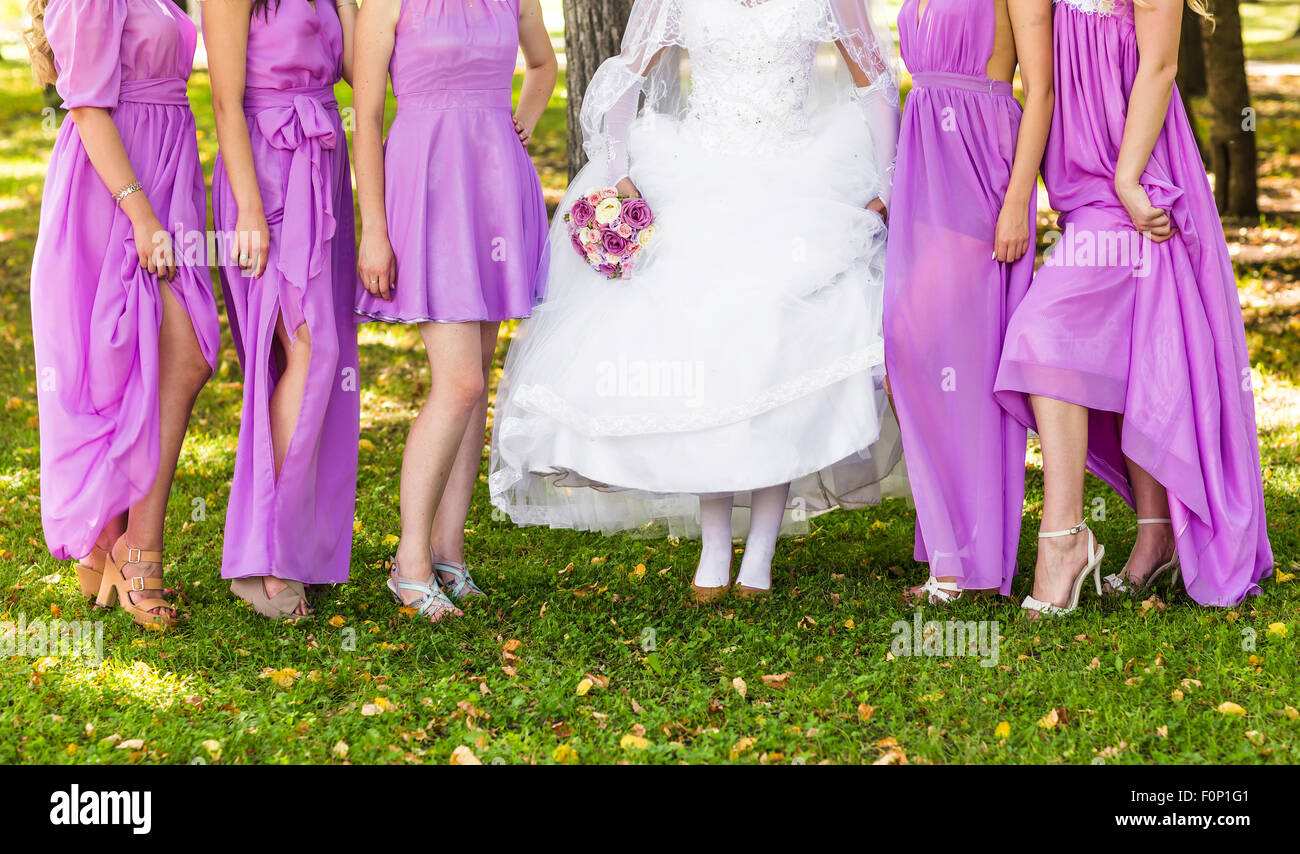Two bridesmaids holding bouquet hi-res stock photography and images - Alamy