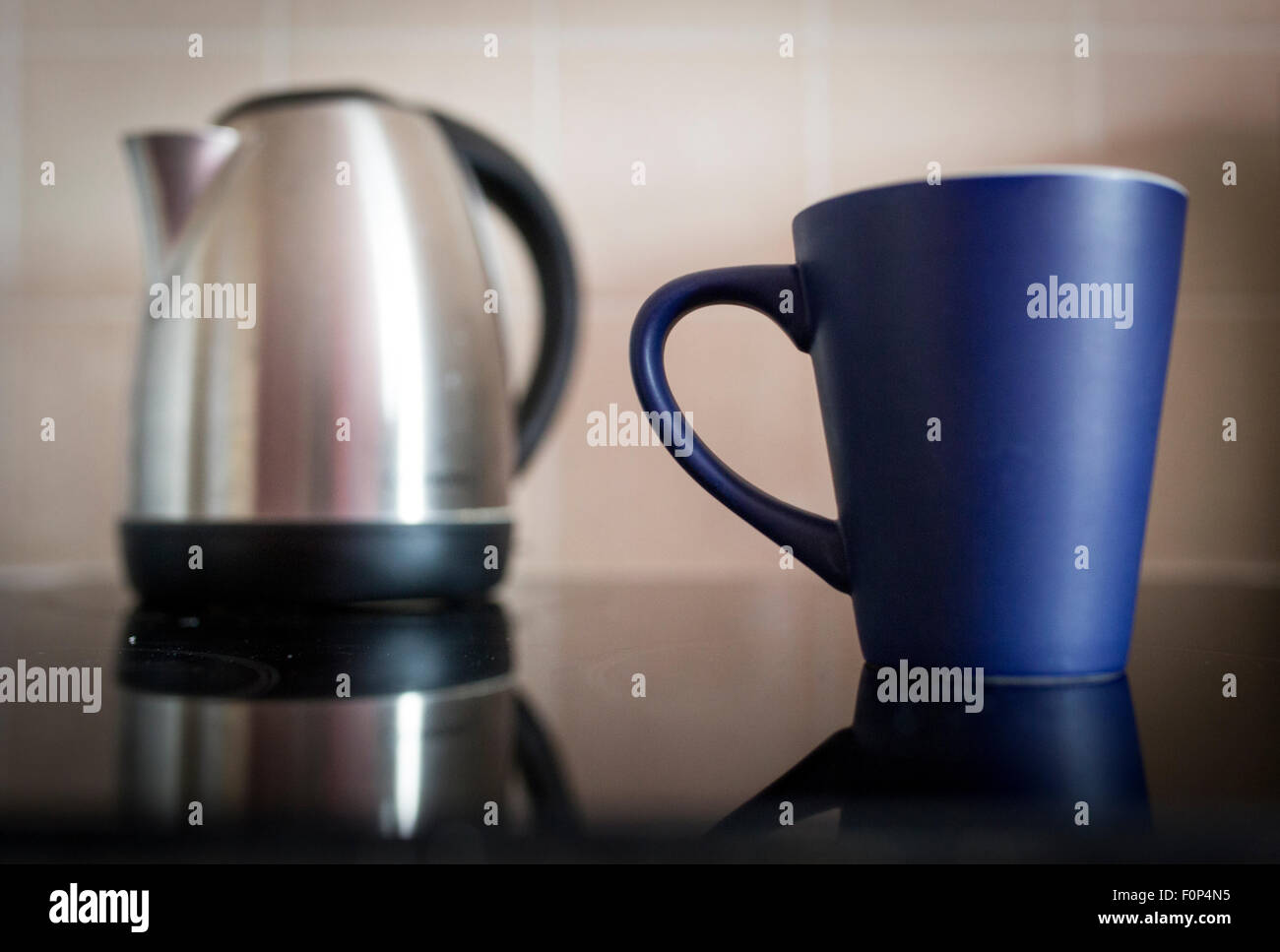 an electric kettle and a mug Stock Photo Alamy