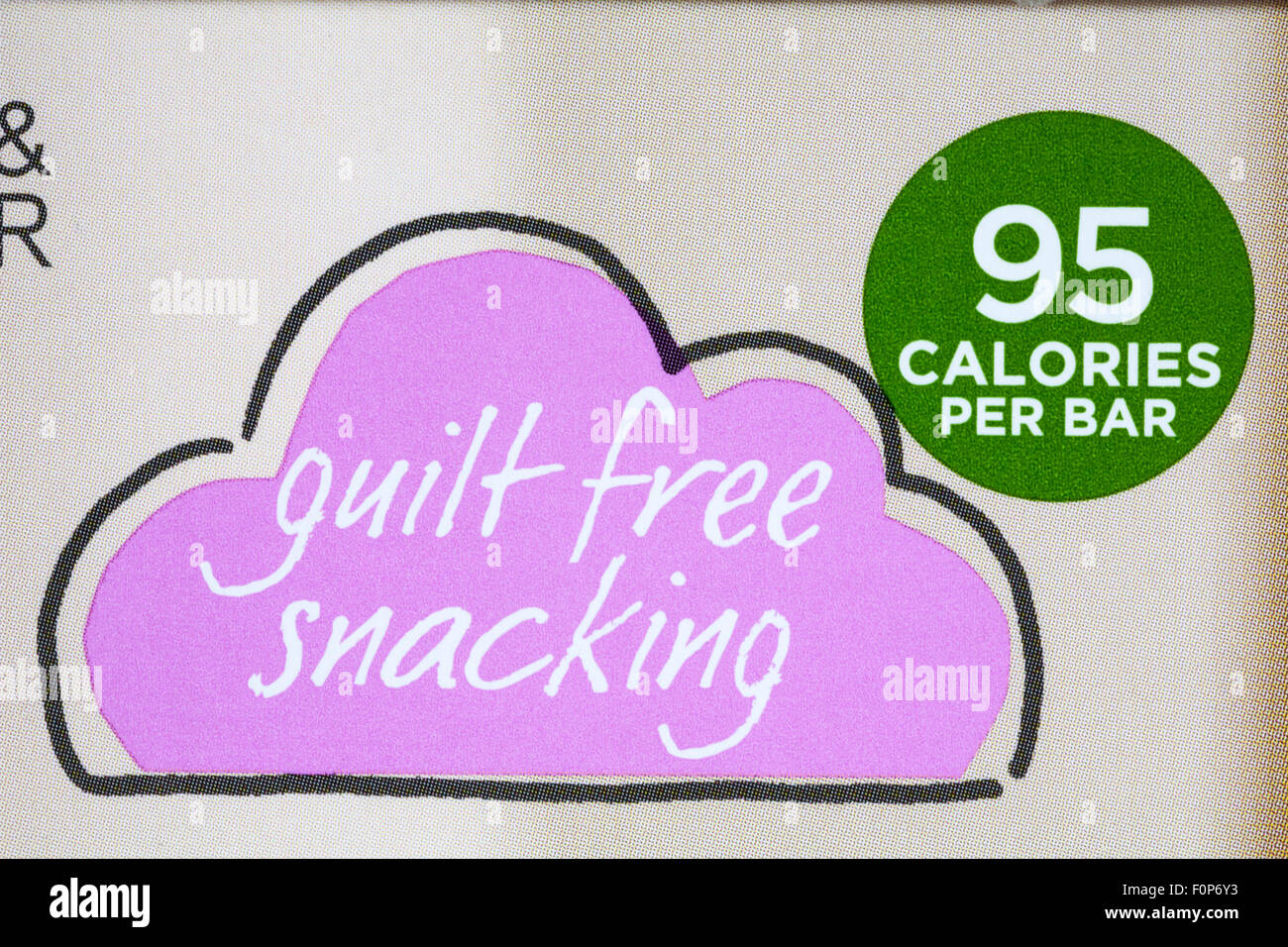 Marks & Spencer guilt free snacking - part of packet of 4 bars fruity popcorn bars packed with apricots cranberries and popcorn Stock Photo