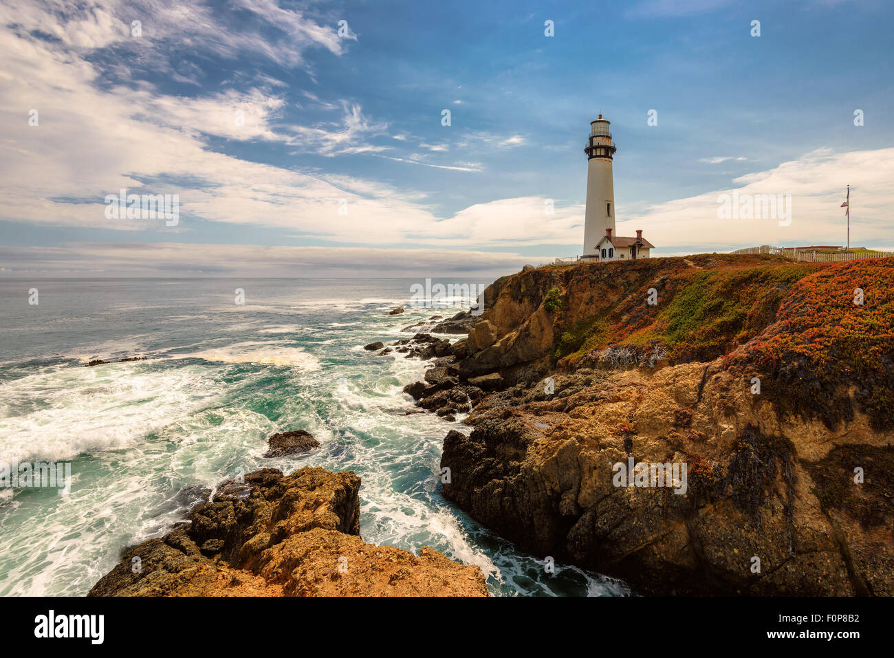 Pigeon Point Lighthouse on the rock, along Pacific coastline in California Stock Photo